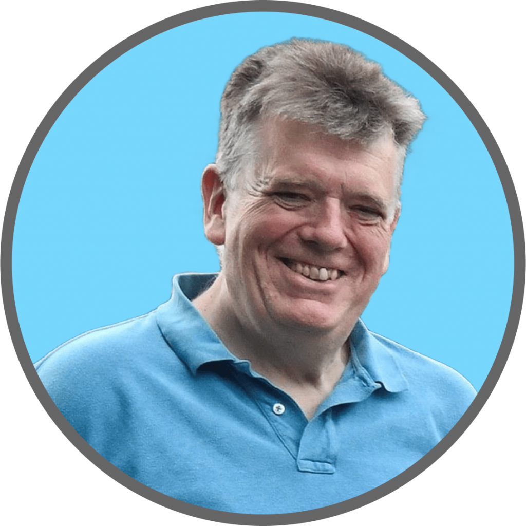 A smiling profile photo of Steve. He has a brown-greyish hair colour and wears a blue polo shirt. The background is a bright, pastel blue.
